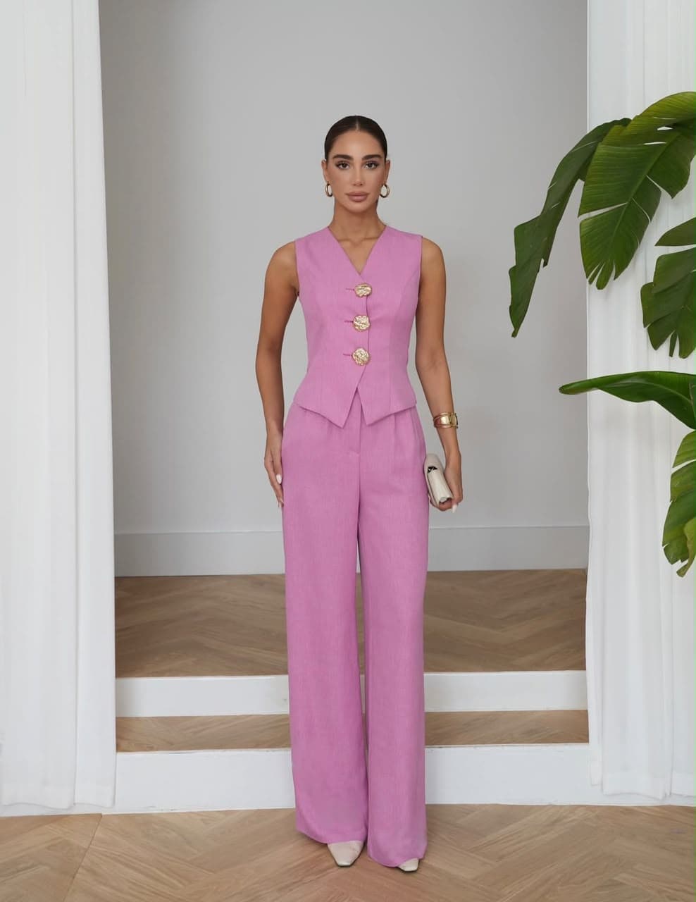 Pink two-piece vest and wide-leg trousers set
